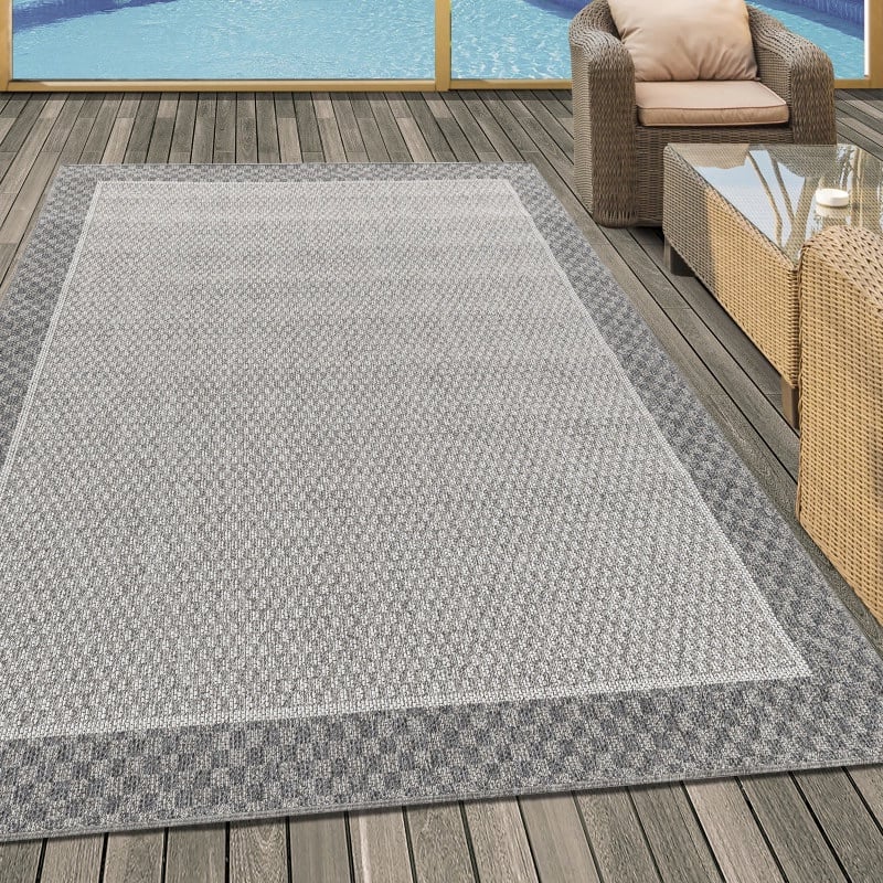 Anna Indendørs/Udendørs Gulvtæppe i Creme med Simpel Ternet Kant fra Rugs by Uniquebeds Home & Living | Flere Størrelser