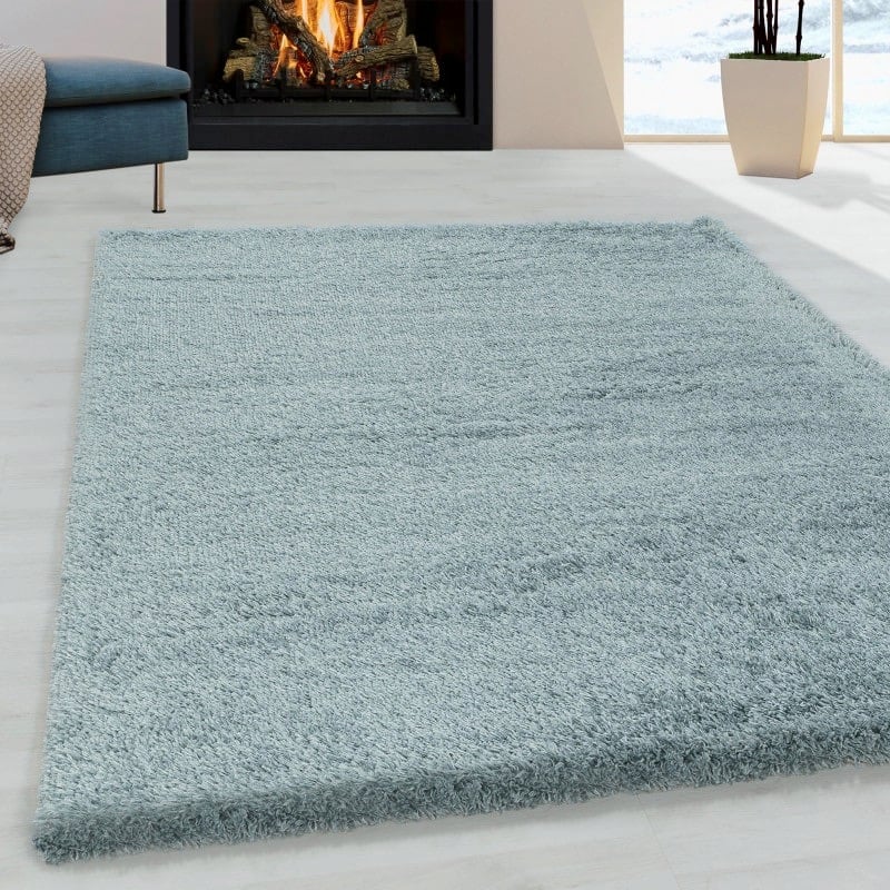 Louisa Ensfarvet Gulvtæppe i Blå fra Rugs by Uniquebeds Home & Living | Flere Størrelser i Firkantet & Rund
