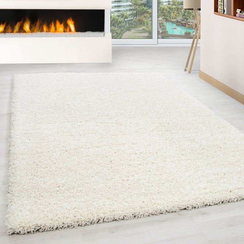 Luna Ensfarvet Fluffy Gulvtæppe i Creme fra Rugs by Uniquebeds Home & Living | Flere Størrelser i Firkantet & Rund