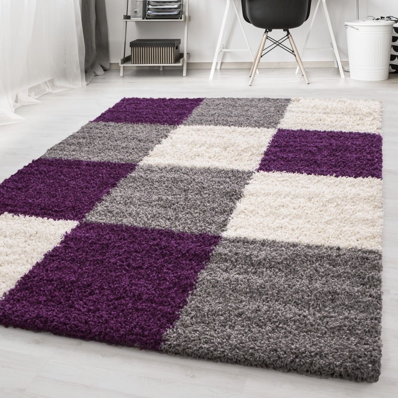 Nora Fluffy Ternet Gulvtæppe i Lilla fra Rugs by Uniquebeds Home & Living | Flere Størrelser