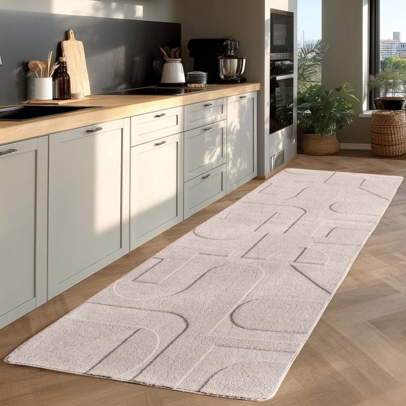 Olivia Cremefarvet Gulvtæppe fra Rugs by Uniquebeds Home & Living | Flere Størrelser