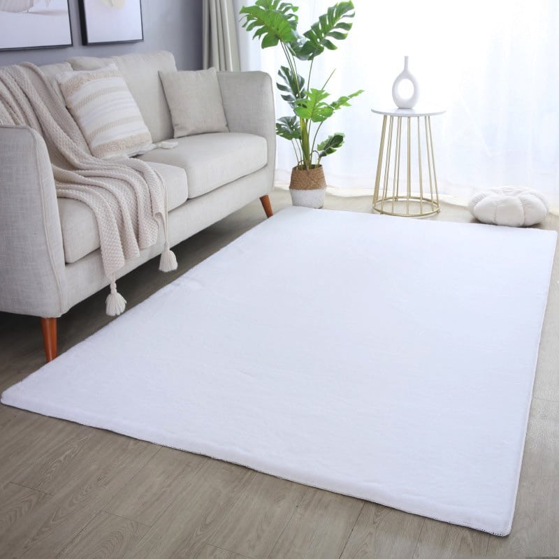 Violet Gulvtæppe i Hvid fra Rugs by Uniquebeds Home & Living | Flere Størrelser i Firkantet & Rund