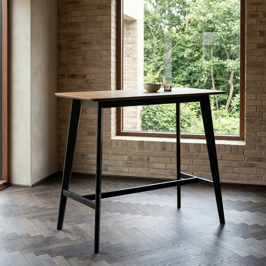 Roxby Barbord i Natur Egetræ med Fodstøtte & Stel i Sort Gummitræ fra Actona | B120xD60xH105cm - Billede 1