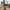 Roxana Spisebordsstol med Armlæn i Mellemgrå Stof med Sort Stel fra Unique Furniture | B57,5xD62xH88cm