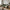 Lido 2,5 Personers Sofa i Olivengrøn Polyester med To Puder & Ben i Sort Træ fra House Nordic | B180xL93xH76 cm