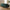 Lido 3 Personers Sofa i Mørkegrøn Velour med 2 Puder & Ben i Natur Træ fra House Nordic | B210xL93xH76 cm