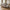 Lido Hjørnesofa Åben Ende Højrevendt i Stone Polyester med Fire Puder & Ben i Sort Træ fra House Nordic | B257xL92-220xH76 cm