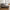 Lido Venstrevendt Hjørnesofa med Åben Ende i Lysegrå Polyester med 4 Puder & Ben i Natur Træ fra House Nordic | B257xL92-220xH76 cm