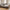 Lido Venstrevendt Loungesofa i Stone Polyester med 4 Puder & Ben i Sort Træ fra House Nordic | B290xL170xH76 cm