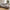 Lido Venstrevendt Loungesofa i Stone Polyester med 4 Puder & Ben i Sort Træ fra House Nordic | B290xL170xH76 cm