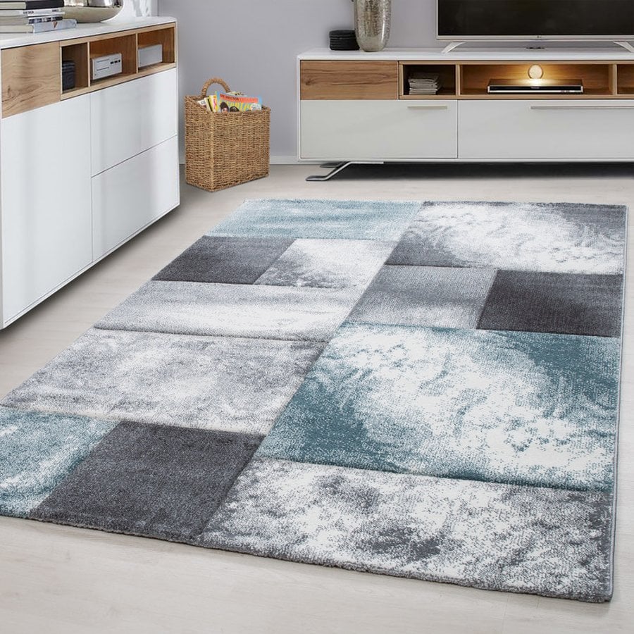 Mason Gulvtæppe i Blå med Kant fra Rugs by Uniquebeds Home &amp; Living | Flere Størrelser