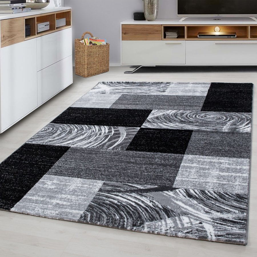 Sebastian Gulvtæppe i Sort med Kant fra Rugs by Uniquebeds Home &amp; Living | Flere Størrelser