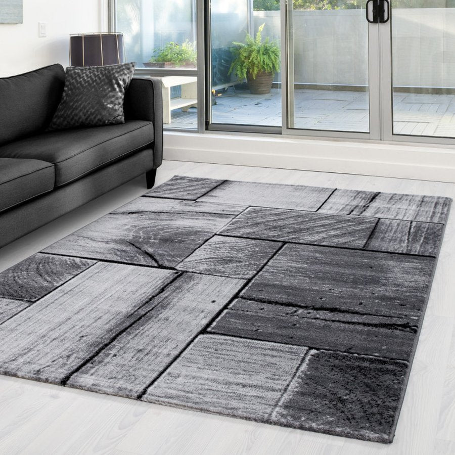 Sebastian Gulvtæppe i Sort med Kant fra Rugs by Uniquebeds, Home &amp; Living | Flere Størrelser