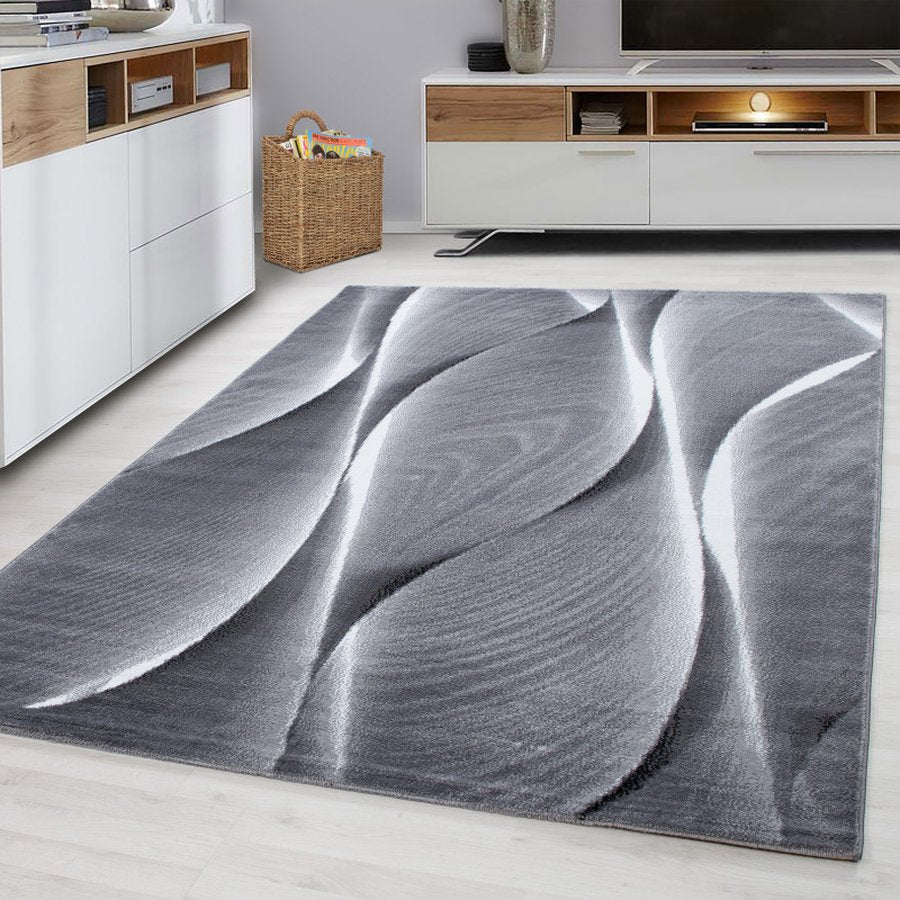 Sebastian Gulvtæppe i Sort med Kant fra Rugs by Uniquebeds Home &amp; Living | Flere Størrelser