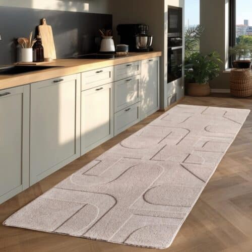 Olivia Cremefarvet Gulvtæppe fra Rugs by Uniquebeds Home & Living | Flere Størrelser