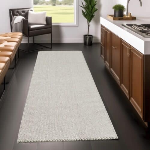 Hallie Cremefarvet Gulvtæppe fra Rugs by Uniquebeds Home & Living | Flere Størrelser