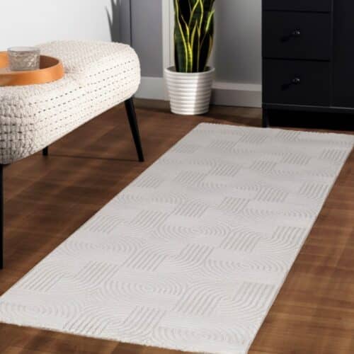 Maeve Cremefarvet Gulvtæppe med Simpelt Mønster fra Rugs by Uniquebeds Home & Living | Flere Størrelser