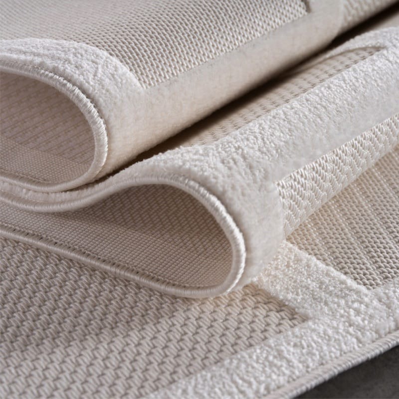 Millie Cremefarvet Gulvtæppe i Polypropylen med Simpelt Kantet Mønster fra Rugs by Uniquebeds Home & Living | Flere Størrelser 2