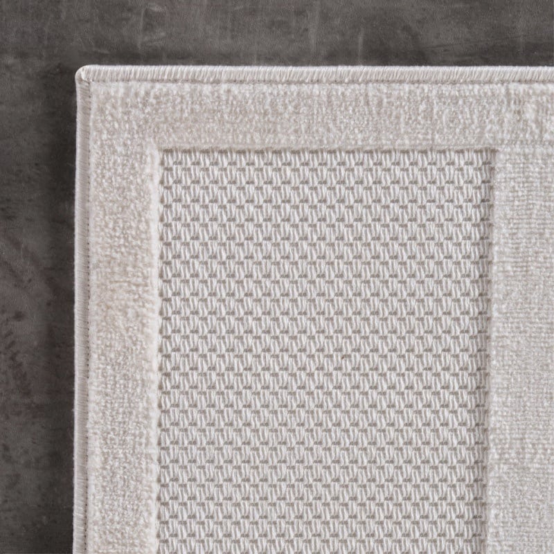 Millie Cremefarvet Gulvtæppe i Polypropylen med Simpelt Kantet Mønster fra Rugs by Uniquebeds Home & Living | Flere Størrelser 3