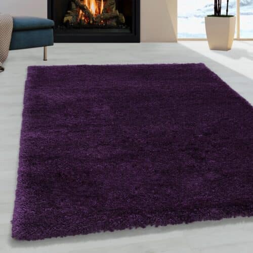 Louisa Ensfarvet Gulvtæppe i Lilla fra Rugs by Uniquebeds Home & Living | Flere Størrelser i Firkantet & Rund