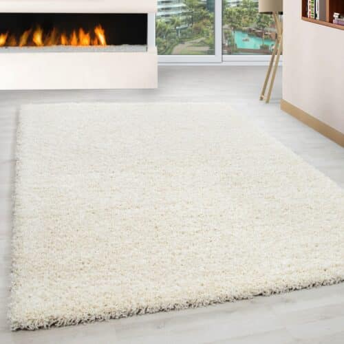 Luna Ensfarvet Fluffy Gulvtæppe i Creme fra Rugs by Uniquebeds Home & Living | Flere Størrelser i Firkantet & Rund
