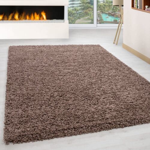 Luna Ensfarvet Fluffy Gulvtæppe i Mocca fra Rugs by Uniquebeds Home & Living | Flere Størrelser i Firkantet & Rund