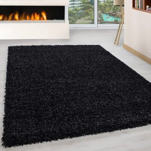 Luna Ensfarvet Fluffy Gulvtæppe i Sort fra Rugs by Uniquebeds Home & Living | Flere Størrelser i Firkantet & Rund