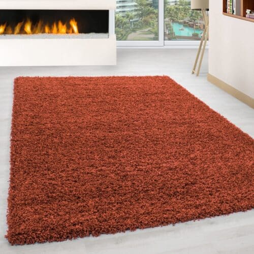 Luna Ensfarvet Fluffy Gulvtæppe i Terra fra Rugs by Uniquebeds Home & Living | Flere Størrelser i Firkantet & Rund