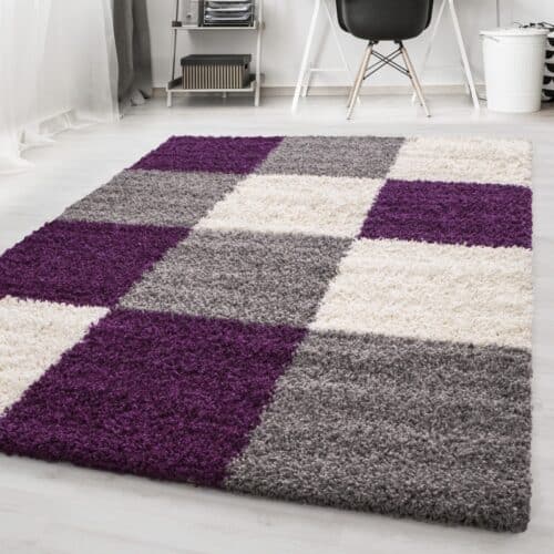 Nora Fluffy Ternet Gulvtæppe i Lilla fra Rugs by Uniquebeds Home & Living | Flere Størrelser