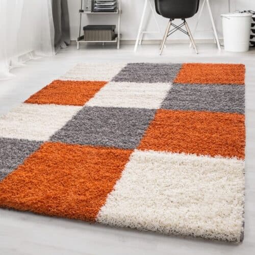 Nora Fluffy Ternet Gulvtæppe i Orange fra Rugs by Uniquebeds Home & Living | Flere Størrelser