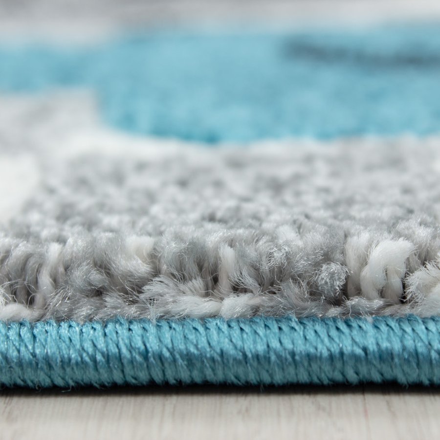 alexander-gulvtaeppe-i-blaa-med-kant-fra-rugs-by-uniquebeds-KIDS1402000460BLUE-4 Alexander Gulvtæppe