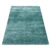 lukas-gulvtaeppe-i-turkis-med-kant-fra-rugs-by-uniquebeds-ho-BRILLIANT1201204200AQUA-5 Lukas Gulvtæppe