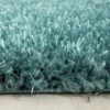 lukas-gulvtaeppe-i-turkis-med-kant-fra-rugs-by-uniquebeds-ho-BRILLIANT80804200AQUA-2 Lukas Gulvtæppe