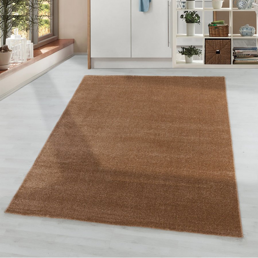 victor-gulvtaeppe-i-kobber-med-kant-fra-rugs-by-uniquebeds-h-RIO802504600COPPER-1 Victor Gulvtæppe